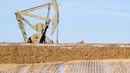 An oil pumpjack operates near Williston, North Dakota